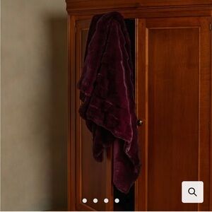 Maroon faux fur throw from indigo